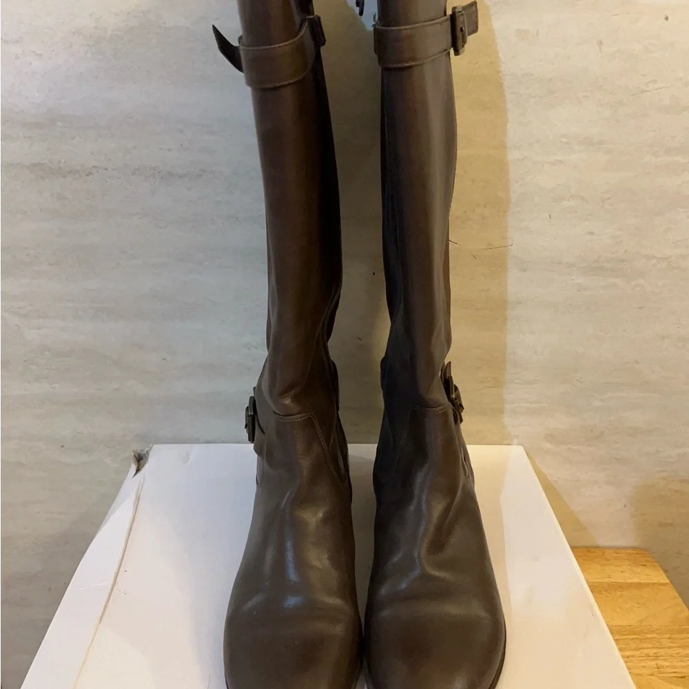 Isaac Mizrahi Live brown leather knee-high riding boots.